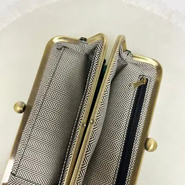 Karen Kiss Lock Clutch - Milly's Boutique